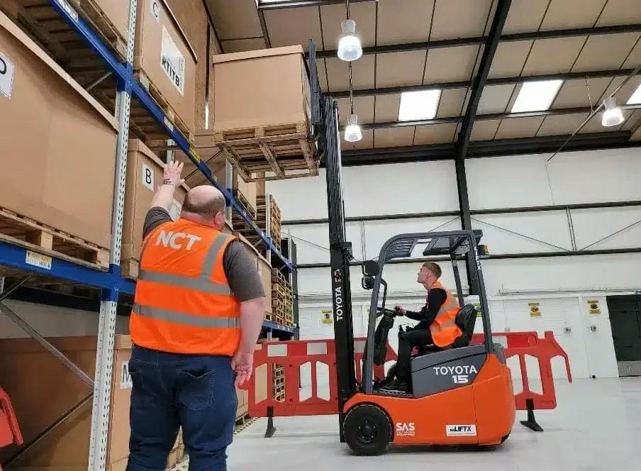 Forklift instructor delivering on-site training
