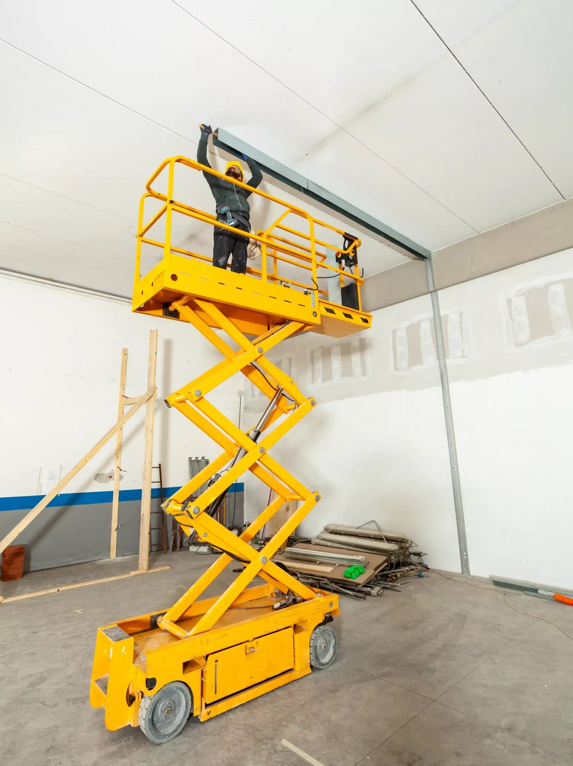Scissor lift MEWP used for indoor elevated work